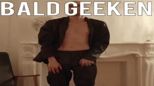 Shirtless Man in Suit Dancing Fireplace Bald Geeken