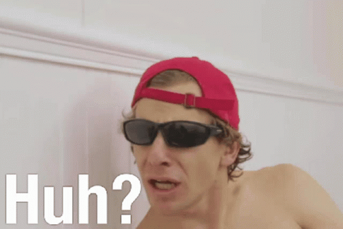 Shirtless Man in Sunglasses and Red Hat Saying Huh