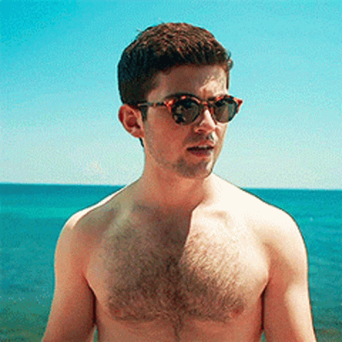 Shirtless Man in Sunglasses Ocean