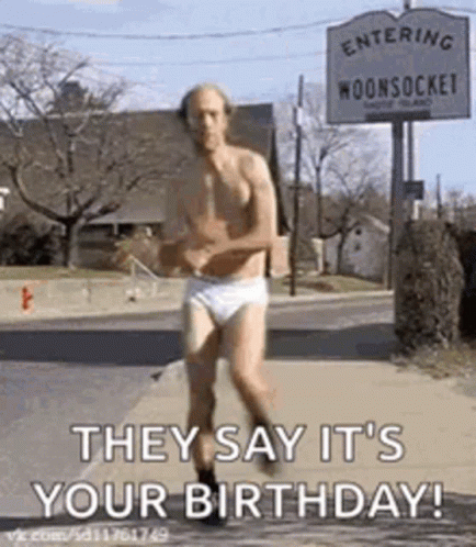 Shirtless Man in Underwear Running Down Sidewalk