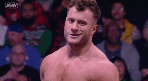 Shirtless Man in Wrestling Ring