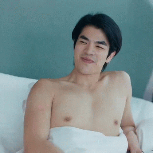 Shirtless Man Laying On Bed Eyes Closed GIF