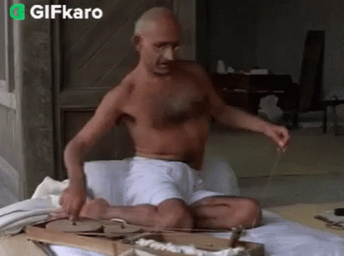 Shirtless Man Playing Instrument