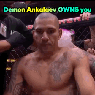 Shirtless Man Sitting in Cage Saying Demon Ankalaev Owns You