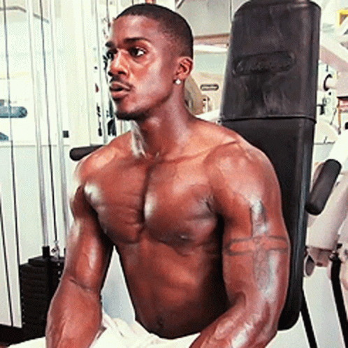 Shirtless Man Sitting On Gym Machine With G-Power GIF