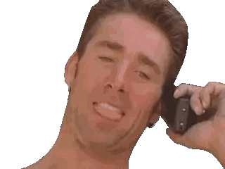 Shirtless Man Smiling on Phone
