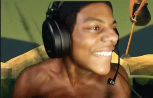 Shirtless Man Smiling With Headphones And Shovel GIF