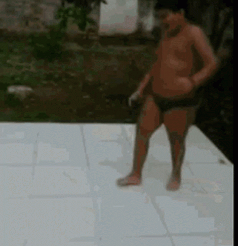 Shirtless Man Standing