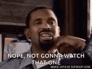 Shirtless Man Standing At Window Hands On Hips GIF