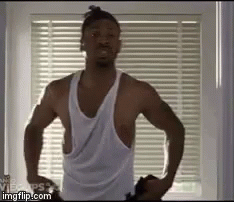 Shirtless Man Standing At Window Hands On Hips GIF