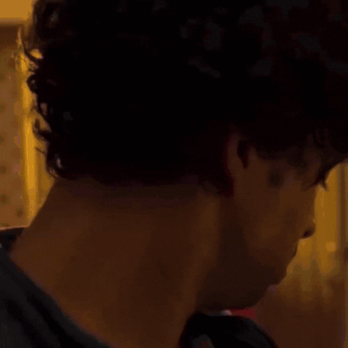 Shirtless Man Standing Before UFC Sign GIF
