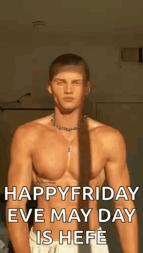 Shirtless Man Standing in Front of Mirror