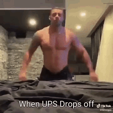 Shirtless Man Standing on Bed When UPS Drops Off