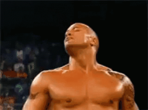 Shirtless Man Standing with Eyes Closed