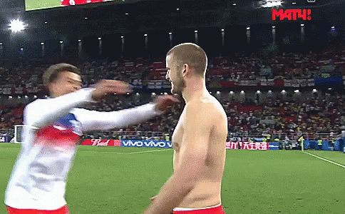 Shirtless Man Tackled on Soccer Field With Math Sign