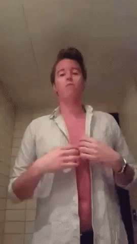Shirtless Man Taking Off Shirt