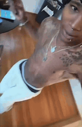 Shirtless Man Taking Selfie In Mirror GIF