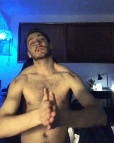Shirtless Man Thumbs Up Blue Light