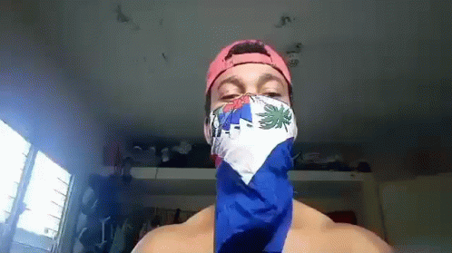 Shirtless Man Wearing Flag Bandana
