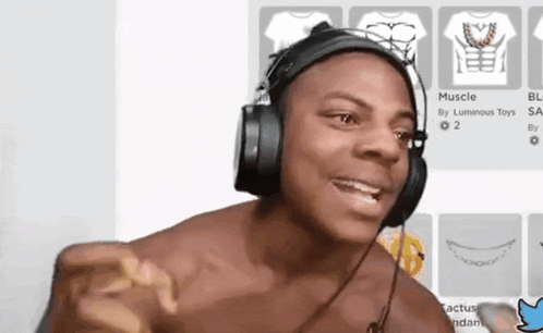 Shirtless Man Wearing Headphones Pointing GIF