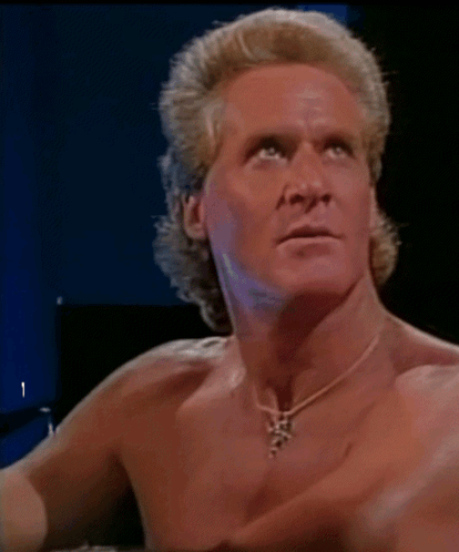 Shirtless Man Wearing M Necklace