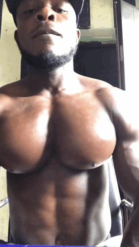 Shirtless Man With Beard And Huge Muscles GIF