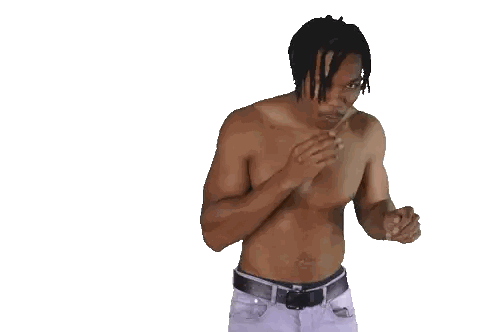 Shirtless Man with Dreadlocks Boxing
