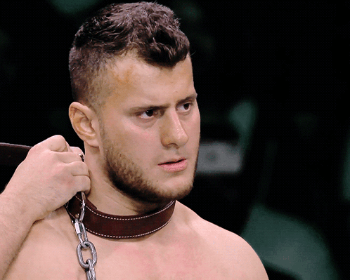 Shirtless Man With Leather Collar and Chains