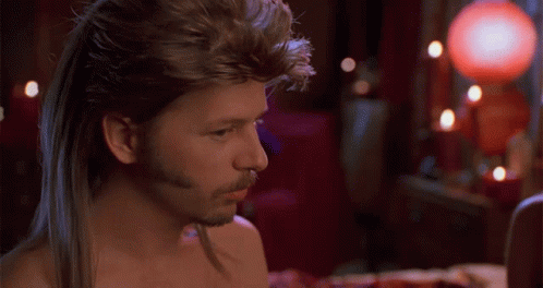 Shirtless Man With Long Hair And Beard Looking GIF
