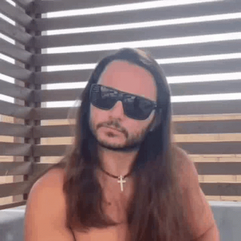 Shirtless Man with Long Hair and Beard