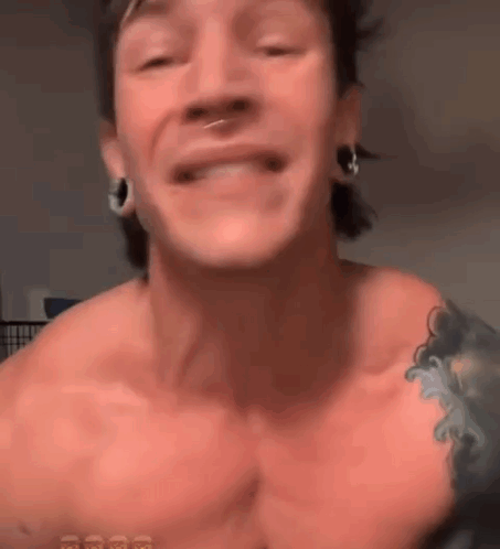 Shirtless Man With Tattoo Smiling Talking GIF