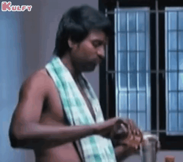 Shirtless Man With Towel At Window GIF