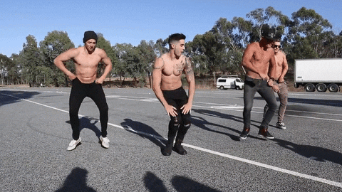 Shirtless Men On The Street Get Low GIF