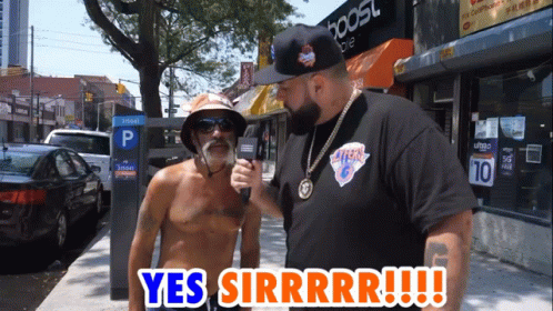 Shirtless Men Talking by Parking Meter