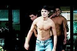 Shirtless Men Walking Together
