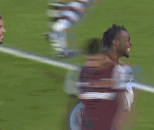 Shirtless Soccer Player Running Towards Goal GIF