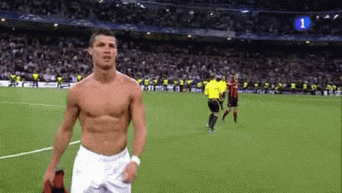 Shirtless Soccer Player Walking