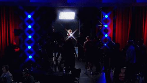 Shirtless UFC Fighter in Front of Cage