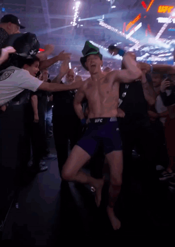 Shirtless UFC Fighter In Purple Shorts Dancing GIF