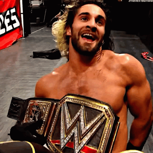Shirtless Wrestler Holding WWE Title Belt