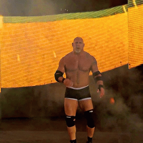 Shirtless Wrestler in Front of WWE Screen