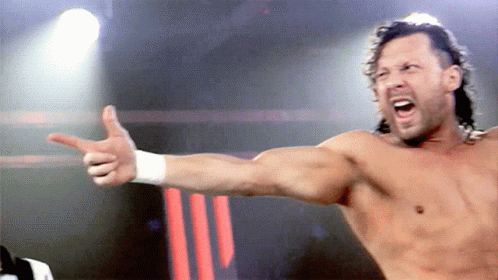 Shirtless Wrestler Pointing