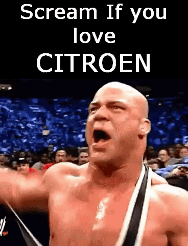 Shirtless Wrestler Screaming In Front Of Crowd Saying Scream If You Love Citroen GIF