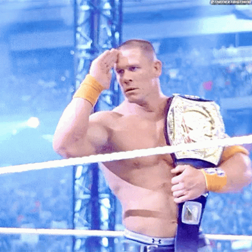 Shirtless Wrestler With Championship Belt In Ring GIF