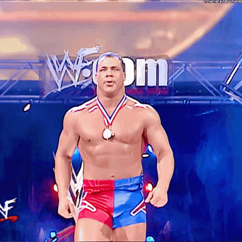 Shirtless Wrestler With Medal And W Dm Sign GIF