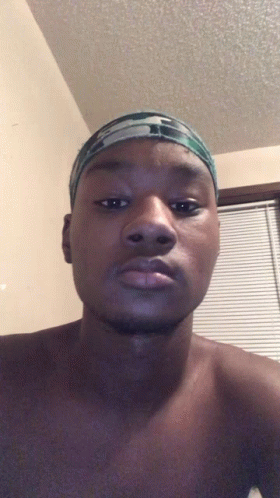 Shirtless Young Man With Headband