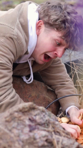 Shocked Guy Found Pot Of Gold GIF