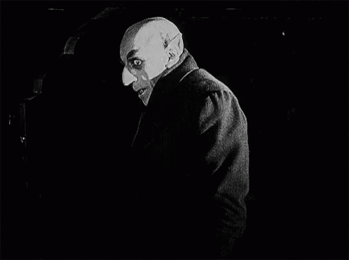 Shocked Nosferatu Turning Back GIF
