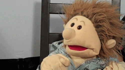 Shocked Puppet Hand Over Mouth GIF