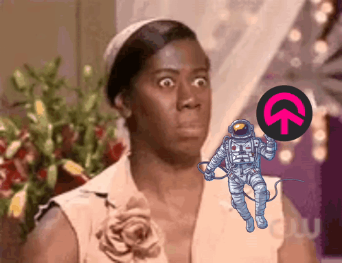 Shocked Woman Looking at Astronaut Holding Circle With Upward Arrow